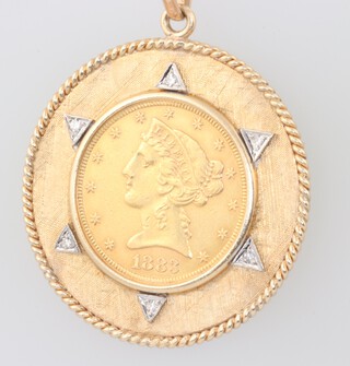 An American 1883 5 dollar coin set in a yellow metal mount marked 14k and set white stones, gross weight 14.9grams 