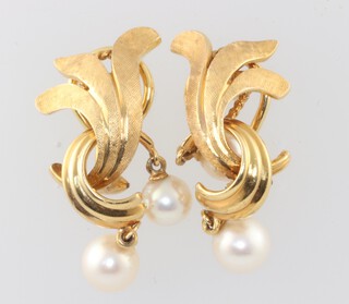 A pair of yellow metal earrings set pearls, marked 14K, gross weight 10.3g 