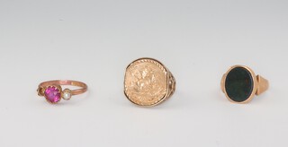 A 9ct yellow gold gem and pearl set ring (1 pearl missing), a yellow metal dress ring set a bloodstone (cut) and a 9ct ring, gross weight 7.6 grams  