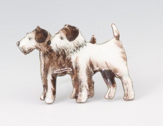 A 1930's yellow metal and enamelled brooch in the form of 2 rough haired Terriers 2cm, contained in a plush box 