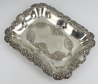 A Victorian rectangular embossed silver dressing table tray Birmingham 1898 30cm x 23cm, 318 grams 