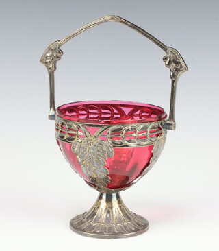 A WMF pierced silver plated basket with vinous decoration and red glass liner 12cm 