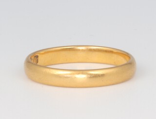 A 22ct yellow gold wedding band, size L, 3.1 grams 