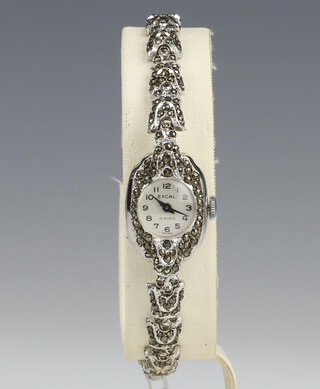 A lady's Excal cocktail wristwatch contained in a silver case, London 1958 with original box 