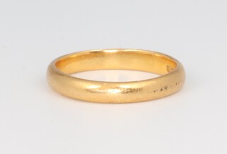 A 22ct yellow gold wedding band, size J,  3.2 grams 