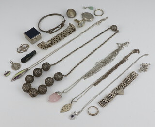 A silver gate bracelet and a collection of costume jewellery