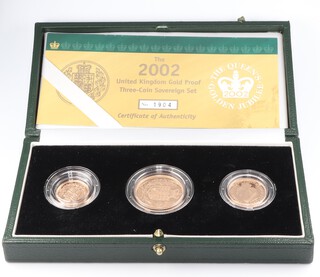 A 2002 Elizabeth II Golden Jubilee sovereign set comprising sovereign, two pound coin and half sovereign, cased no.1904 