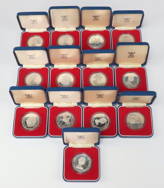 Thirteen 1970's proof silver coins and commemorative crowns, each weighing 28.276grams, all cased 