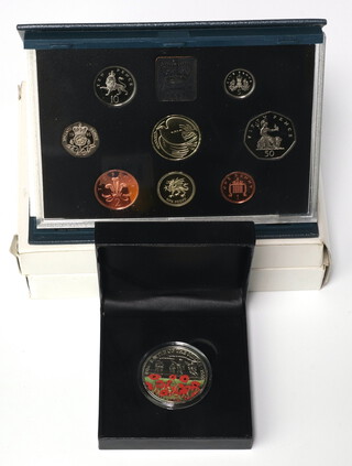 A 2016 five pound Somme coin, together with 3 cased proof sets 1995, 1996 and 1997 