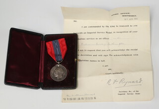 A George V Imperial Service medal to William Howard of The Ordnance Survey, together with letters of commission 