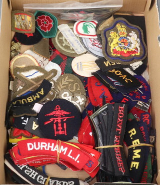 A collection of Military cloth shoulder titles 