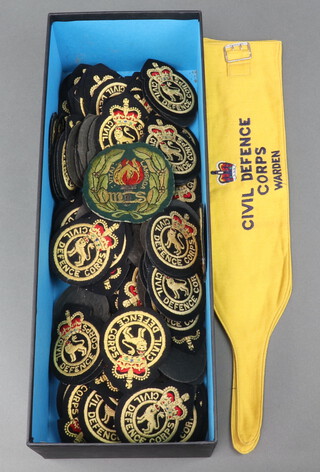 Two Civil Defence Corps arm bands and a large collection of Civil Defence Corps cloth badges 