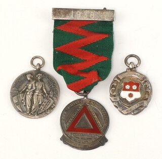 A London Motor Cycling Club London-Edinburgh Car medallion marked Car June 6-7th 1924 RRBickwood together with a Safe Driving medal and a silver watch chain medallion 