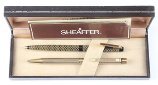 A Schaffer gold plated ballpoint pen together with 1 other cased 