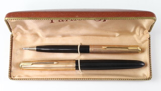 A Parker 51 fountain pen and ditto propelling pencil cased 