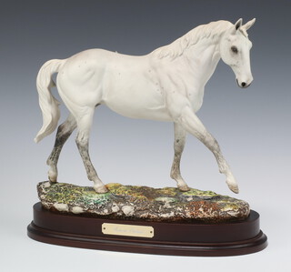 A Royal Doulton limited edition figure of Desert Orchid DA134 no.2493 complete with certificate, raised on an oval base 31cm h 
