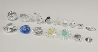 A Swarovski Crystal  of a hippopotamus 6cm, 3 circular flower heads 3cm, a Swarovski Crystal  heart 4cm, a collection of figures including elephant, duck, 2 rabbits, puffer fish, squirrel and penguin 4cm, a Collector's Club paperweight, together with unmarked glass figures of a tortoise, shell heart and stone 