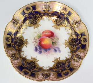 A Victorian Royal Worcester plate decorated peaches and grapes with blue and gilt banding 25cm, the reverse with purple Worcester mark and 21 dots  