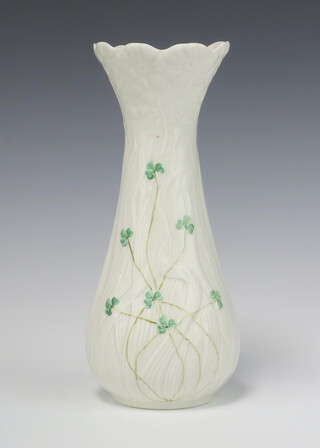 A Belleek club shaped vase decorated clover, the base with green mark 26cm 