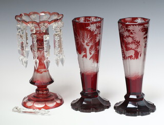 A pair of 19th Century octagonal Bohemian red overlay glasses vases decorated stags 25cm (chips to base) together with a Bohemian glass lustre 25cm  