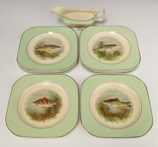 A Woods Ivory Ware 9 piece fish service with sauce boat (cracked) and 8 plates 22cm 