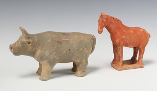 A pottery figure of a standing cow 12cm x 23cm (some chips to horns and ears) and a ditto Tang horse 16cm x 15cm  