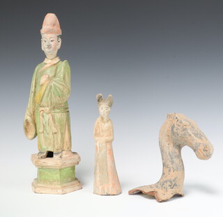 A Chinese terracotta figure of a standing lady 21cm, a ditto terracotta figure 38cm, a broken section of pottery in the form of a horses head 22cm 