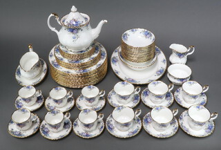 A 67 piece Royal Albert Moonlight Rose pattern dinner/tea service comprising oval meat plate, 12 dinner plates, 6 side plates, 6 tea plates, 12 pudding bowls, oval bowl, sauce boat and stand, teapot, cream jug, sugar bowl, 6 tea cups, 6 saucers, 6 coffee cups, 6 saucers,  