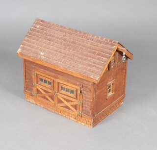 A 19th/20th Century scratch built wooden model of a barn, the interior fitted a manger 43cm h x 52cm x 34cm 
