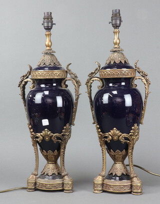 A pair of blue porcelain and gilt metal mounted twin handled table lamps in the form of lidded urns 46cm h x 21cm diam. 