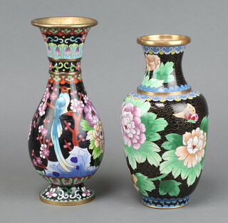 A Japanese black ground cloisonne enamel waisted club shaped vase decorated a bird on a circular foot 25cm x 8cm together with 1 other 23cm x 7cm 