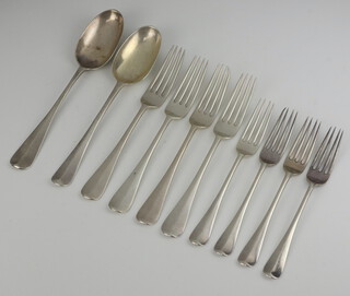 Two silver Old English rat tail pattern dessert spoons London 1919 and 1924, 4 ditto table forks London 1901 and 4 pudding forks London 1901, 670 grams 