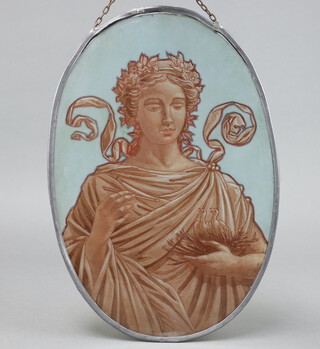 An oval painted glass panel decorated a classical lady feeding birds, contained within a lead frame 36cm x 24cm  