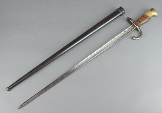 A chassepot bayonet the blade dated 1879 complete with scabbard 