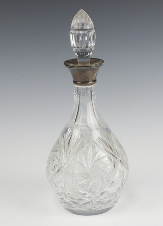A cut glass mallet shaped decanter with silver collar Birmingham 1976 31cm 