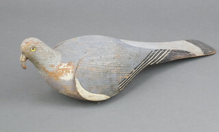 A 19th Century wooden painted decoy pigeon with glass eye 38cm x 10cm 