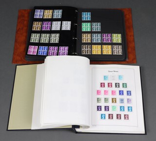 A GB stamp album of mint and used stamps 1924-1992, together with an album of Elizabeth II GB stamps 