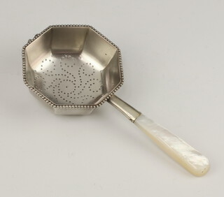 Tiffany, an American Sterling octagonal tea strainer with mother of pearl handle marked Tiffany & Co 14788 22282 Sterling 925-1000M, gross weight 44 grams 