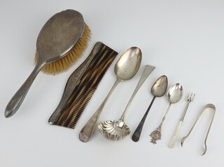 A George III silver Old English pattern sifter spoon London 1829, a ditto pudding spoon, 2 silver teaspoons, pair of sugar tongs 134 grams together with a silver bladed pickle knife with mother of pearl grip, silver backed hairbrush and comb 