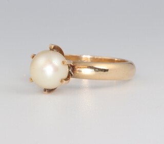 A Continental yellow metal cultured pearl ring 5.4 grams, size O