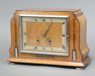 Smith Enfield, an Art Deco mantel clock with rectangular silvered dial with Roman numerals contained in a walnut case, clock complete with pendulum and key 23cm h x 33cm w x 13cm d 
