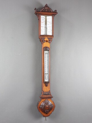 J H Steward, 406, 66 Strand, 54 Cornhill London, a Victorian mercury stick barometer and thermometer with porcelain dial and indicators, contained in a carved oak case 107cm h x 22cm 