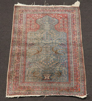 A Caucasian style prayer rug with mihrab 103cm x 90cm 