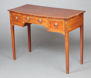 A 19th Century inlaid mahogany bow front side table fitted one long and two short drawers with brass lion mask ring drop handles 78cm h x 102cm w x 52cm d 