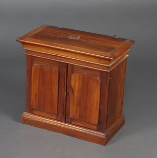 A Victorian mahogany collector's cabinet with moulded cornice, interior fitted recess above 4 short drawers, raised on a platform base 48cm h x 52cm w x 29cm d 