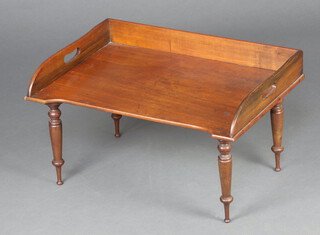 A Victorian mahogany bed tray with three quarter gallery raised on turned supports 34cm h x 60cm w x 41cm d 
