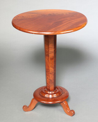 A Victorian figured mahogany circular wine table raised on a tapered chamfered column, circular base and scroll feet 75cm h x 56cm diam. 