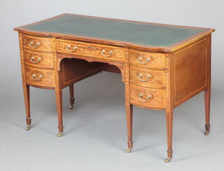 Maple & Co, an Edwardian inlaid and crossbanded mahogany writing table with green inset writing surface, fitted 1 long and 6 short drawers, raised on square shaped supports 74cm h x 122cm w x 57cm d 