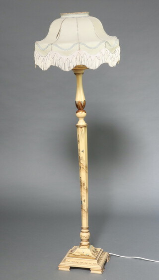 A 1930's white lacquered chinoiserie hexagonal turned standard lamp, on a square base 153cm h 