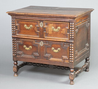 A Jacobean style oak chest of 2 drawers with geometric mouldings, replacement drop handles, raised on turned supports with spiral turned stretcher 79cm h x 87cm w x 61cm d 